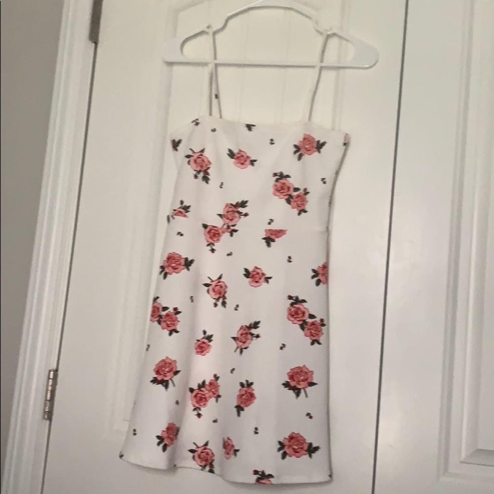 White thigh length dress